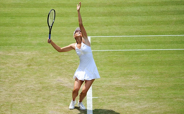Maria Sharapova serving a tennis ball